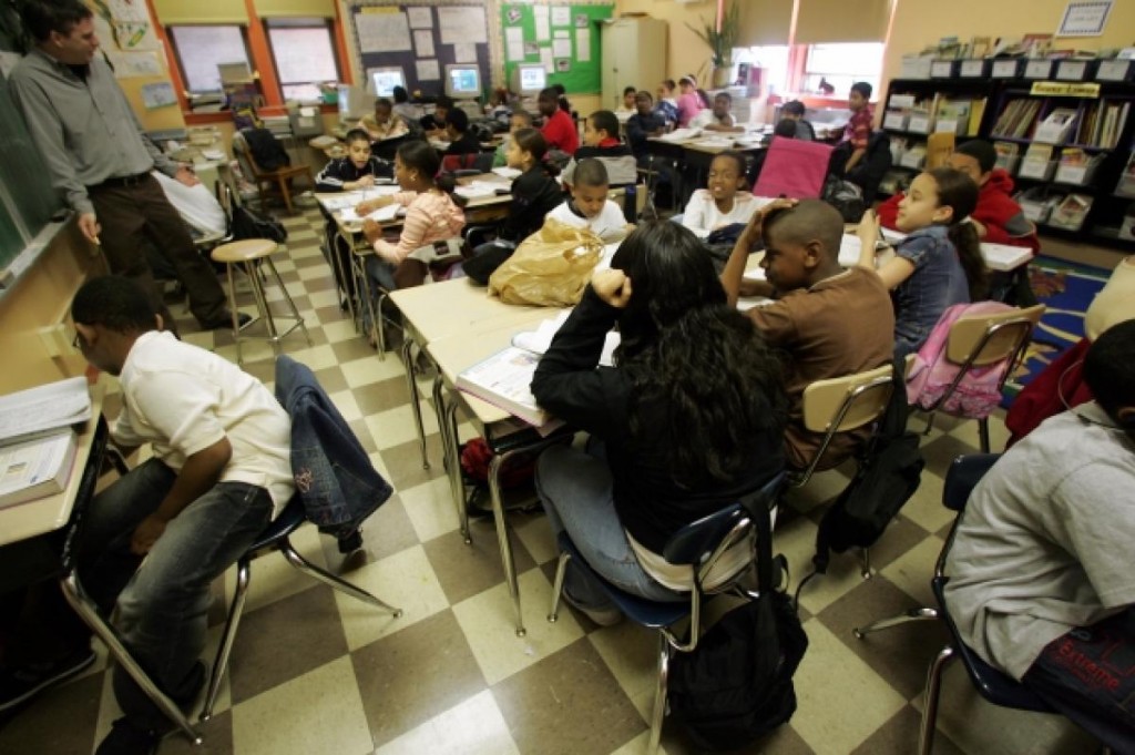 A crowded New York City classroom with students trying to learn in September, 2013. Photo taken by: Michael Albans